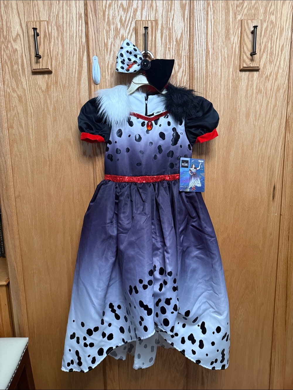 Disney Cruella-Inspired Dalmatian Spot Costume Dress with bonus hair bow.